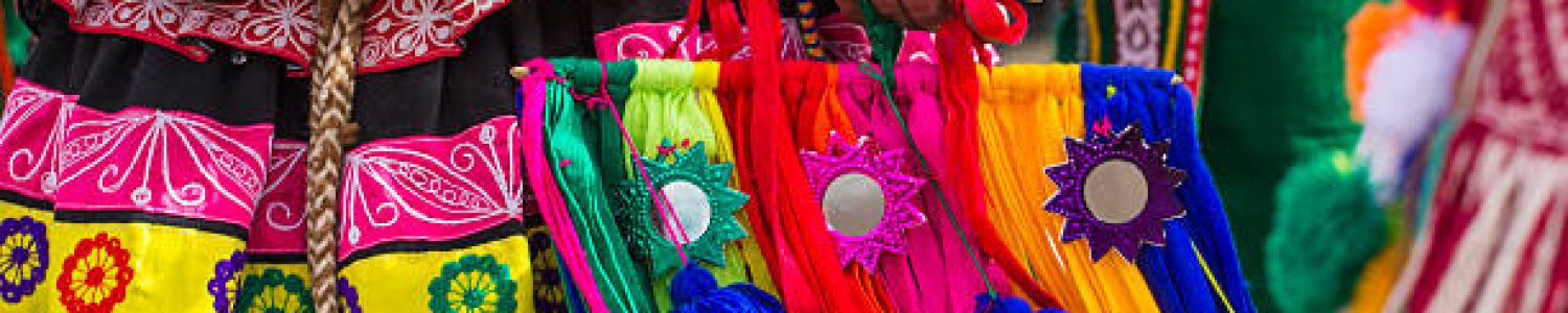 Peruvian dancers at the parade in Cusco. People in traditional clothes.